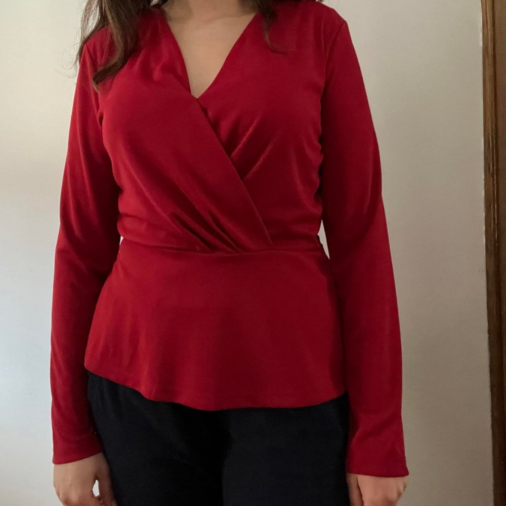 Red peplum wrap blouse